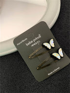 A Pair of Popular Butterfly Hair Clips and Shiny Clips