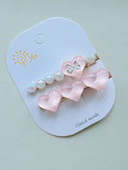 A Pair of Pearl Heart Bangs Clips