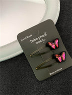 A Pair of Popular Butterfly Hair Clips and Shiny Clips