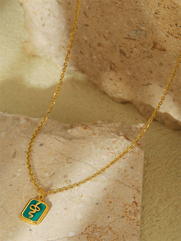 Gold-tone Necklace with Green Snake Pendant