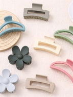 Hair Clips Shaped Like Flowers and Pumpkins