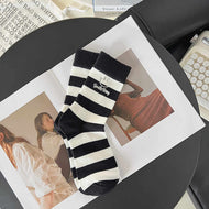 Versatile Black and White Striped Smiley Face Socks