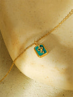 Gold-tone Necklace with Green Snake Pendant