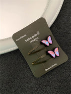 A Pair of Popular Butterfly Hair Clips and Shiny Clips