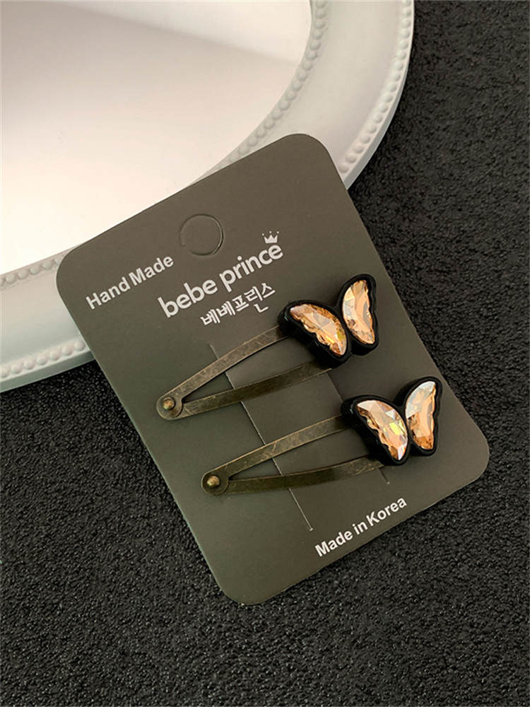 A Pair of Popular Butterfly Hair Clips and Shiny Clips