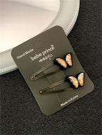 A Pair of Popular Butterfly Hair Clips and Shiny Clips